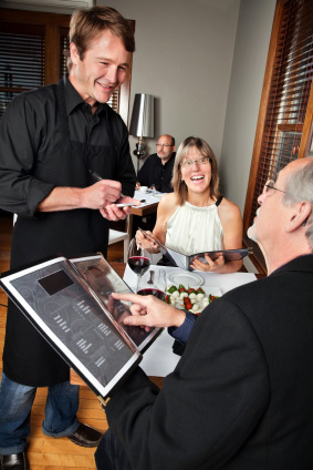 Image of restaurant waiter taking orders