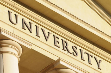 Image of "University" sign on side of building
